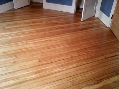 Refinished 100 year old Heart Pine wood floor in Iowa City