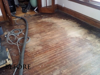 Water-damaged and stained red oak floor