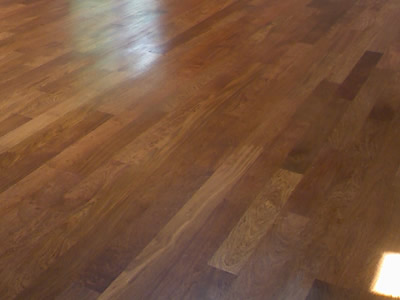 New install of wide-width Brazilian Cherry (Jatoba) hardwood floor in Coralville