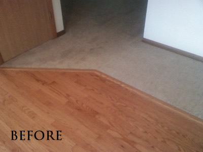 Carpet in living room, prefinished in dining room